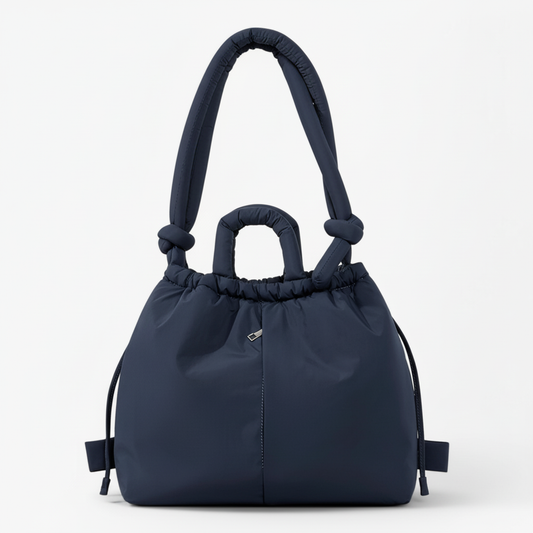 Navy blue quilted puffer bag